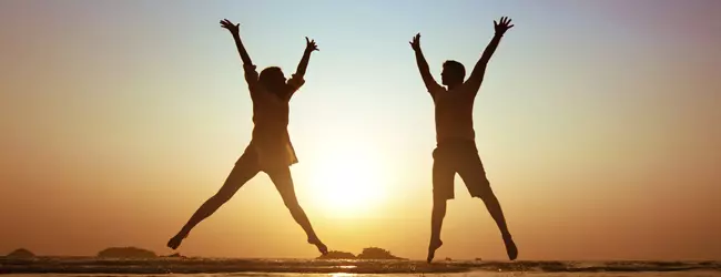 AttitudeWellness_JumpingSunsetPeople.jpg