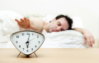 SleepYourWay_ManSleeping-HittingClock.jpg